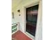 Exterior view of the condo unit's entrance at 1100 Martinique Dr # 208, Winter Haven, FL 33884