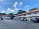 Two-story building with ample parking and balconies at 1100 Martinique Dr # 208, Winter Haven, FL 33884