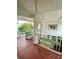 Exterior view of building with walkway and stairs at 1100 Martinique Dr # 208, Winter Haven, FL 33884