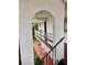 Exterior view of the building showing stairs and balcony at 1100 Martinique Dr # 208, Winter Haven, FL 33884