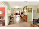 Living area with view into dining room and piano at 512 N 4Th St, Haines City, FL 33844