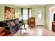 Living room with sofa, chair, and coffee table at 512 N 4Th St, Haines City, FL 33844