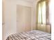 Bedroom with sliding closet doors and a gray comforter at 512 N 4Th St, Haines City, FL 33844
