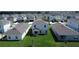 Aerial view of houses with green lawns and a community at 5031 Starboard St, Haines City, FL 33844