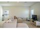 Spacious living area with large sectional sofa and TV at 5031 Starboard St, Haines City, FL 33844