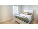 Cozy bedroom with a queen-size bed and neutral decor at 5031 Starboard St, Haines City, FL 33844