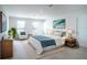 Spacious main bedroom with a king-size bed and ensuite bathroom at 5031 Starboard St, Haines City, FL 33844
