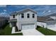 Two-story house with attached garage at 5031 Starboard St, Haines City, FL 33844