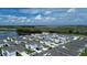 Aerial view of houses and community near a lake at 5031 Starboard St, Haines City, FL 33844
