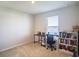 Home office with a desk, chair, and built-in bookcase at 5031 Starboard St, Haines City, FL 33844
