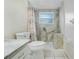Bathroom with walk-in shower and updated fixtures at 3050 Cross Fox Dr, Mulberry, FL 33860