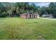 Brick ranch home with large grassy yard at 3050 Cross Fox Dr, Mulberry, FL 33860
