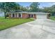 Brick house with attached garage and large yard at 3050 Cross Fox Dr, Mulberry, FL 33860