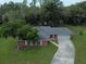 Ranch home with driveway, large backyard and mature trees at 3050 Cross Fox Dr, Mulberry, FL 33860