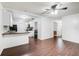Living room with dark wood floors and an open floor plan at 3050 Cross Fox Dr, Mulberry, FL 33860