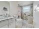 Clean bathroom, walk-in shower, and updated vanity at 3050 Cross Fox Dr, Mulberry, FL 33860