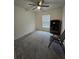 Serene bedroom with ceiling fan and ample floor space at 1036 Mattie Pointe Way, Auburndale, FL 33823