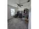 Bright home office featuring built-in shelving and desk at 1036 Mattie Pointe Way, Auburndale, FL 33823