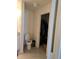 Bathroom with toilet and access to walk-in closet at 1036 Mattie Pointe Way, Auburndale, FL 33823