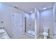 Modern bathroom with a shower and toilet at 1476 Leamington Lane, Winter Haven, FL 33884