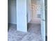 Bedroom with double closets and carpeted floor at 1476 Leamington Lane, Winter Haven, FL 33884