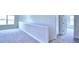 Spacious bedroom with neutral carpeting and large window at 1476 Leamington Lane, Winter Haven, FL 33884
