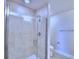 Modern bathroom with a large shower and tile flooring at 1476 Leamington Lane, Winter Haven, FL 33884