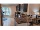 Modern kitchen with granite countertops and island at 296 Krenson Bay Loop, Winter Haven, FL 33881