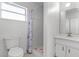 Bathroom with shower, toilet and vanity at 405 W 4Th Ct, Frostproof, FL 33843