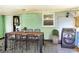 Outdoor patio with a wooden dining table and two washers at 4822 Melody Ln, Lakeland, FL 33805