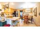 Eat-in kitchen boasts wood cabinets, stainless steel appliances, and a dining area at 4822 Melody Ln, Lakeland, FL 33805