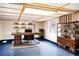 Bright home office with built-in shelving and a large work desk at 4822 Melody Ln, Lakeland, FL 33805