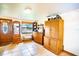 Bright entryway with wood cabinets, tiled floor, and a view to backyard at 4822 Melody Ln, Lakeland, FL 33805