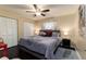 Bedroom with king-size bed and dark wood flooring at 926 Van Dr, Auburndale, FL 33823