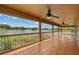 Spacious screened porch with lake views and tile flooring at 3038 Spirit Lake Dr, Winter Haven, FL 33880