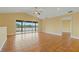 Bright living room with tile floors and access to a balcony at 3038 Spirit Lake Dr, Winter Haven, FL 33880