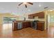 Open concept kitchen with stainless steel appliances and an island at 3038 Spirit Lake Dr, Winter Haven, FL 33880