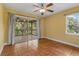 Bedroom with private balcony and water views at 3038 Spirit Lake Dr, Winter Haven, FL 33880
