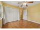 Bright bedroom with double closets and tile floors at 3038 Spirit Lake Dr, Winter Haven, FL 33880