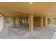 Covered patio area with access door at 3038 Spirit Lake Dr, Winter Haven, FL 33880