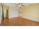 Spacious bedroom with tile floors and ceiling fan at 3038 Spirit Lake Dr, Winter Haven, FL 33880