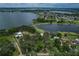 Aerial view of house and neighborhood near lakefront at 3038 Spirit Lake Dr, Winter Haven, FL 33880