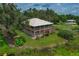 Two-story house with a large backyard and waterfront access at 3038 Spirit Lake Dr, Winter Haven, FL 33880