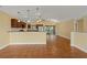 Open living space with tile floors and access to kitchen and patio at 3038 Spirit Lake Dr, Winter Haven, FL 33880