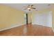Bright bedroom with tile floors, ceiling fan and double door closet at 3038 Spirit Lake Dr, Winter Haven, FL 33880