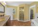 Bathroom with shower and double vanity at 3038 Spirit Lake Dr, Winter Haven, FL 33880