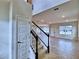 Bright and spacious entryway with staircase at 1480 Leamington Lane, Winter Haven, FL 33884