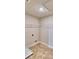 Bright laundry room with overhead storage at 1480 Leamington Lane, Winter Haven, FL 33884