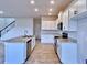 Modern kitchen featuring granite countertops and stainless steel appliances at 1480 Leamington Lane, Winter Haven, FL 33884