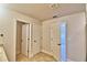 Laundry room with ample storage and tile flooring at 1480 Leamington Lane, Winter Haven, FL 33884